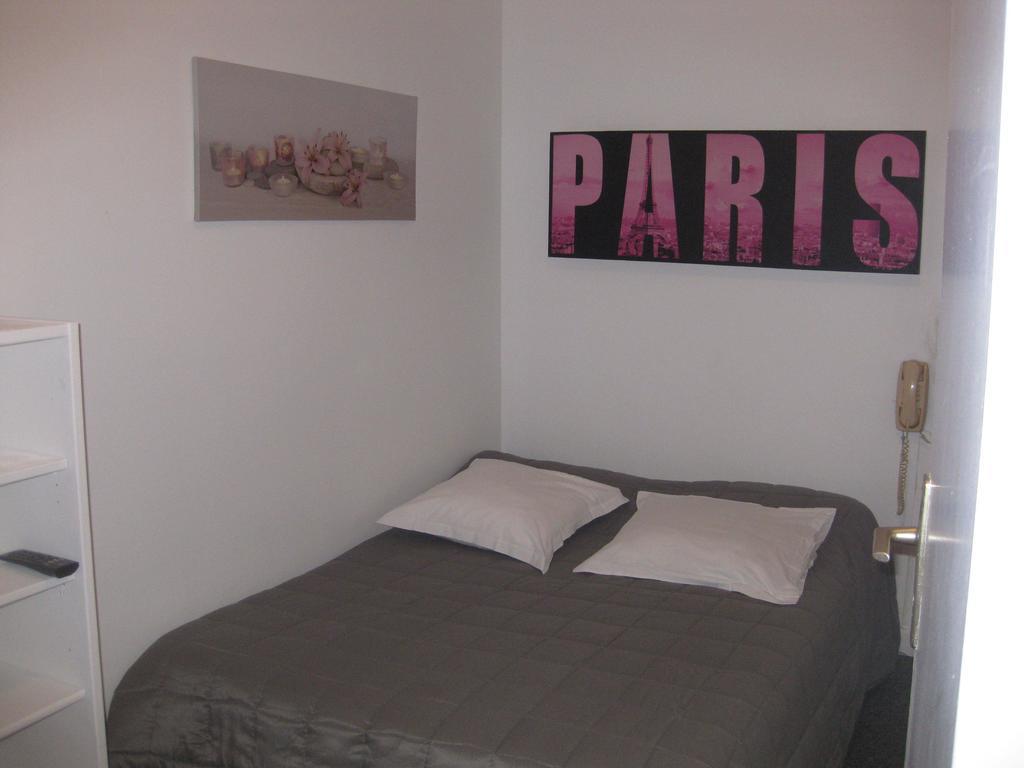 Hotel Le Monopole Reims Habitación foto